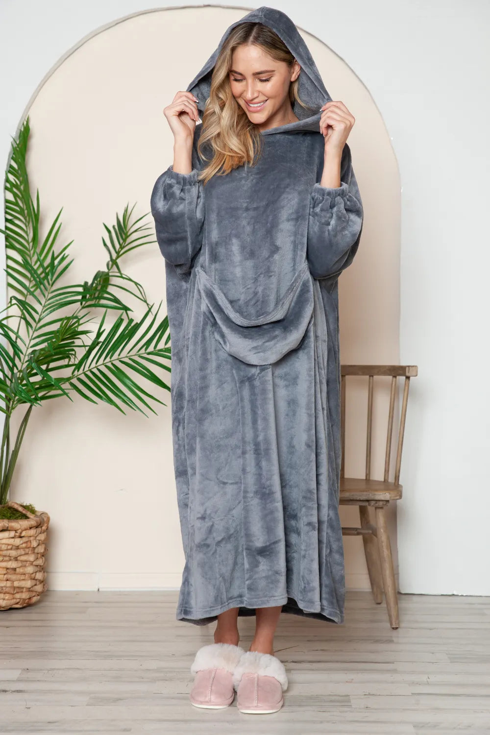Dusty pink Trendsi Double Take full-size pocketed hooded midi lounge dress displayed on a model with a relaxed fit and casual style.