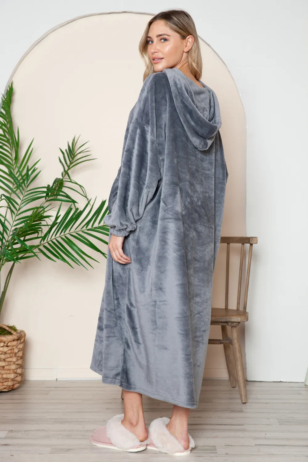 Dusty pink Trendsi Double Take full-size pocketed hooded midi lounge dress laid flat, showing its relaxed fit and hood detail.
