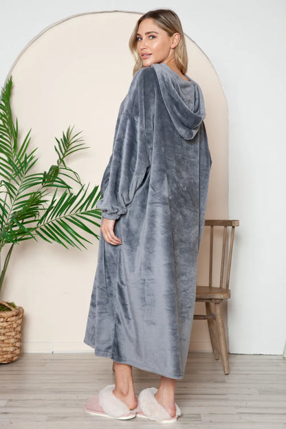 Dusty pink Trendsi Double Take full-size pocketed hooded midi lounge dress laid flat, showing its relaxed fit and hood detail.