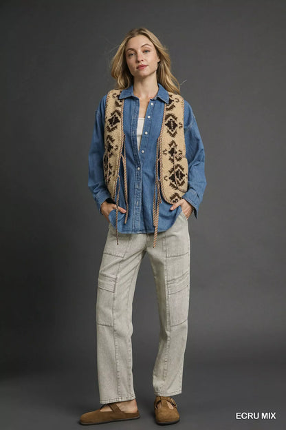 Ecru mixed patterned Sherpa tie-front vest by Umgee, featuring cozy fleece fabric and stylish front tie detail.