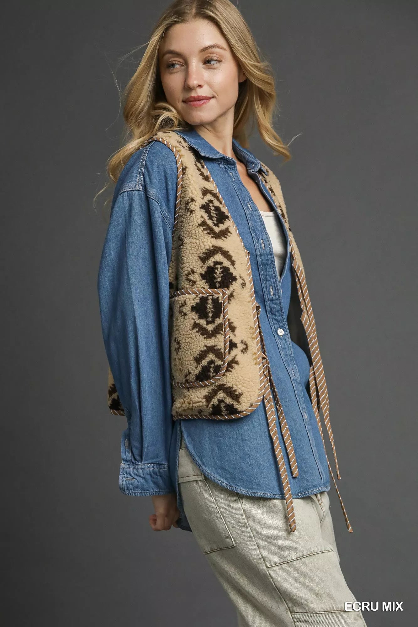 Ecru mixed patterned Sherpa tie-front vest by Umgee, featuring a cozy, textured fabric and stylish front tie detail.