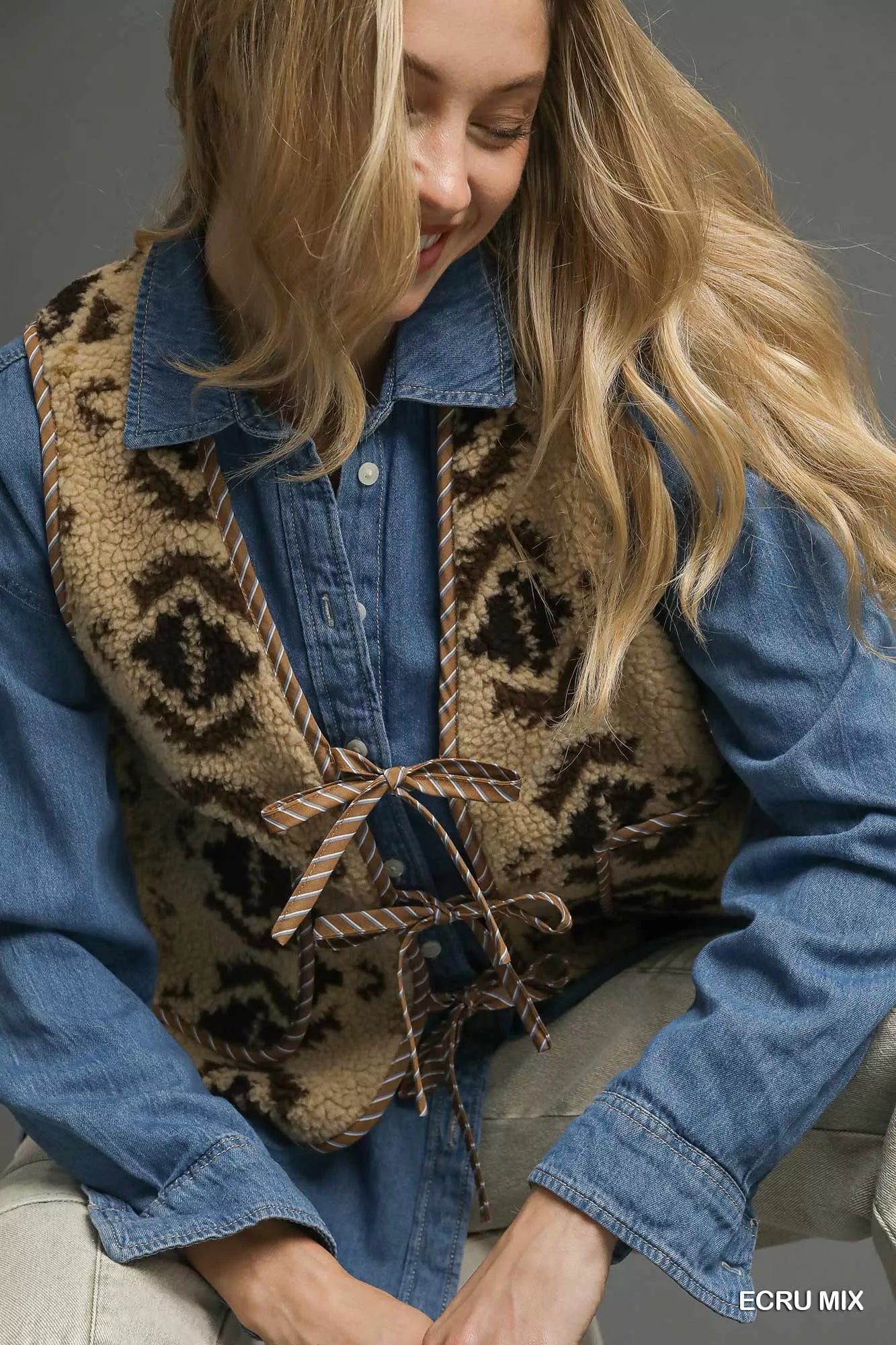 Ecru mix patterned Sherpa tie-front vest by Umgee featuring soft texture and cozy design, perfect for layered fall outfits.