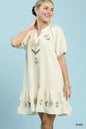 Ecru Umgee embroidered floral babydoll dress with delicate embroidery and a relaxed fit, perfect for casual or semi-formal wear.