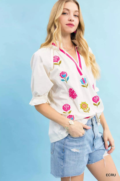 Ecru Umgee embroidered floral top with contrast trim, featuring intricate floral embroidery and stylish design, perfect for casual wear.