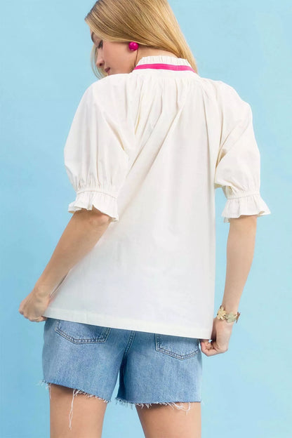 Ecru Umgee embroidered floral top with contrast trim, featuring intricate floral embroidery and stylish design.