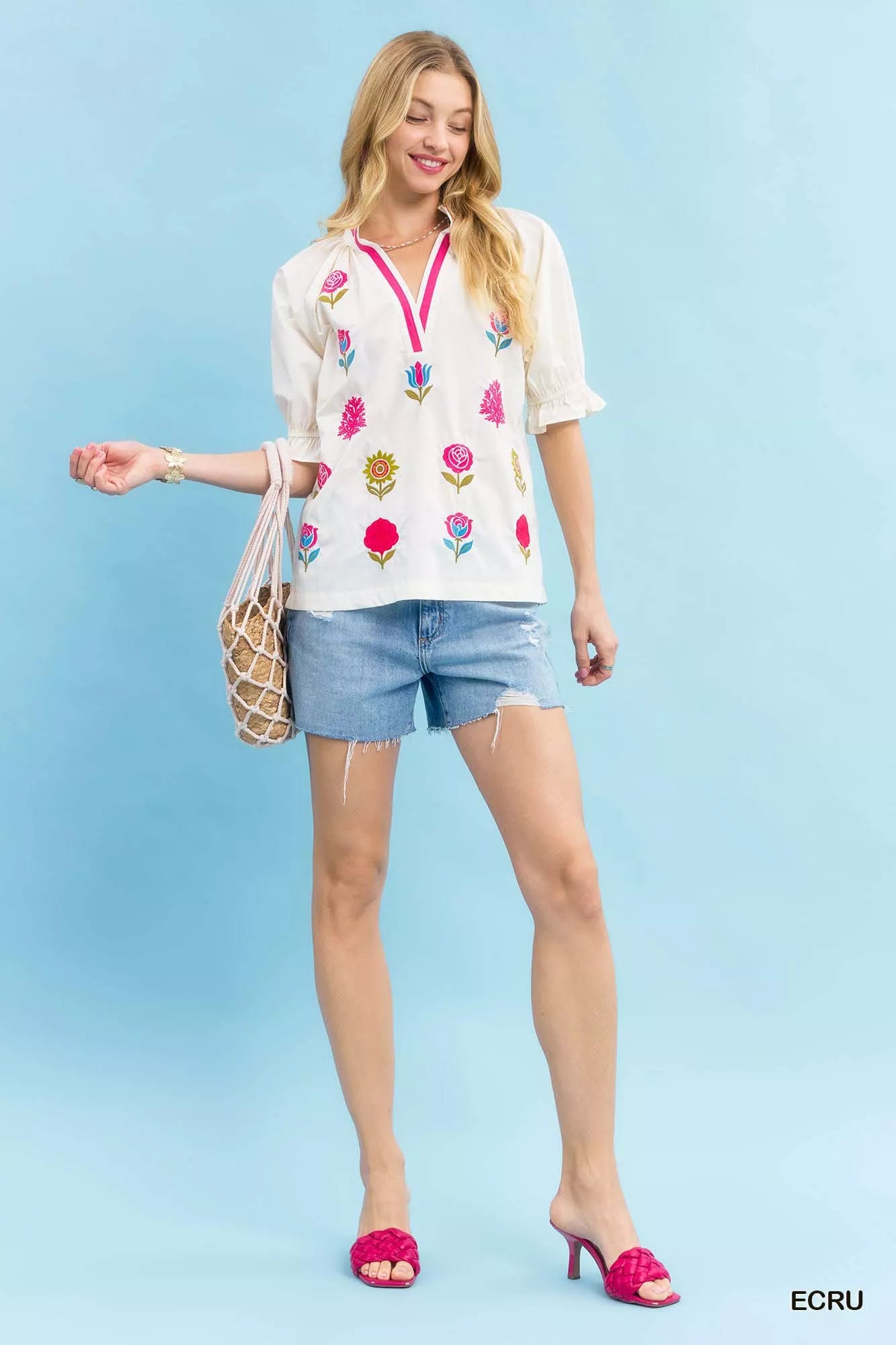 Ecru Umgee embroidered floral top with contrast trim, featuring intricate embroidery and stylish design, perfect for casual wear.