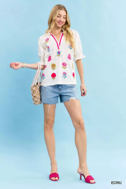 Ecru Umgee embroidered floral top with contrast trim, featuring intricate embroidery and stylish design, perfect for casual wear.