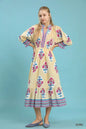 Ecru Umgee Flower Patch Border Print Midi Dress by Trendsi, featuring floral details and a flowing silhouette.