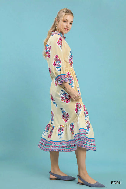 Ecru Umgee floral patch border print midi dress featuring a flowy silhouette and vibrant flower patterns, perfect for casual wear.