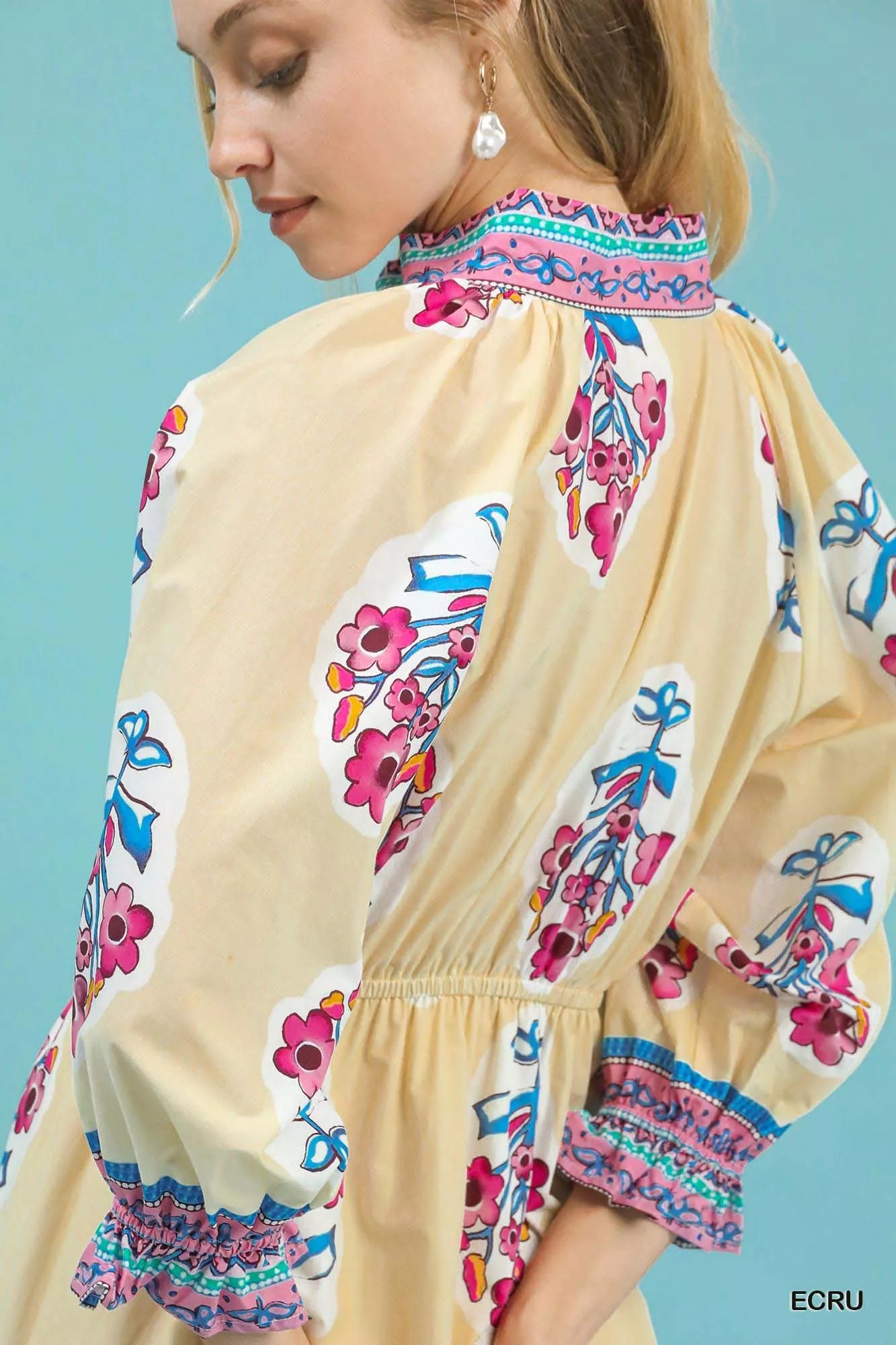Ecru Umgee flower patch border print midi dress with a flowy silhouette and floral design, perfect for casual or dressy occasions.