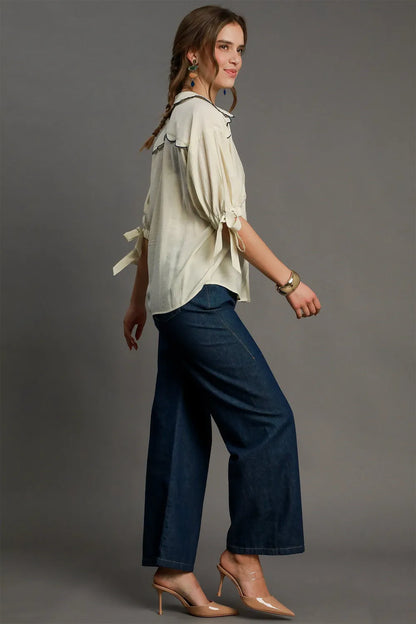 Plus size Umgee embroidered detail button-down shirt in ecru, showcasing intricate embroidery and classic style.