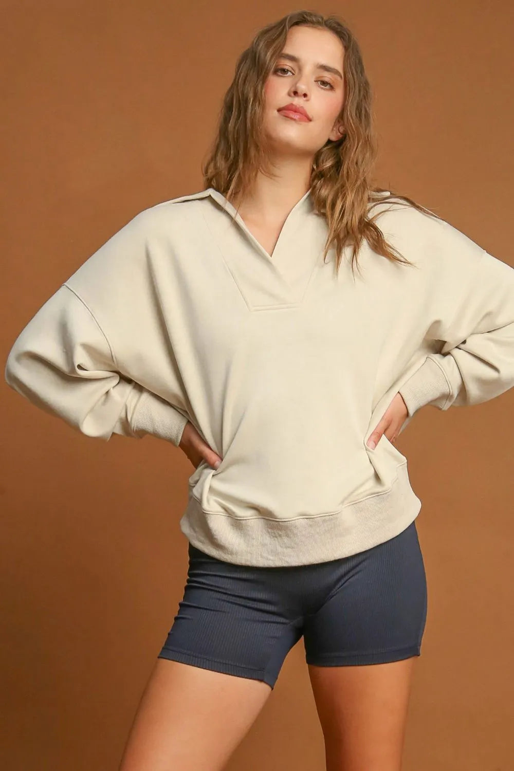 Ecru Umgee Johnny Collar Dropped Shoulder Sweatshirt with relaxed fit and casual style, featuring a collar and dropped shoulders.