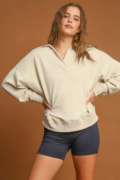 Ecru Umgee Johnny Collar Dropped Shoulder Sweatshirt with relaxed fit and casual style, featuring a collar and dropped shoulders.