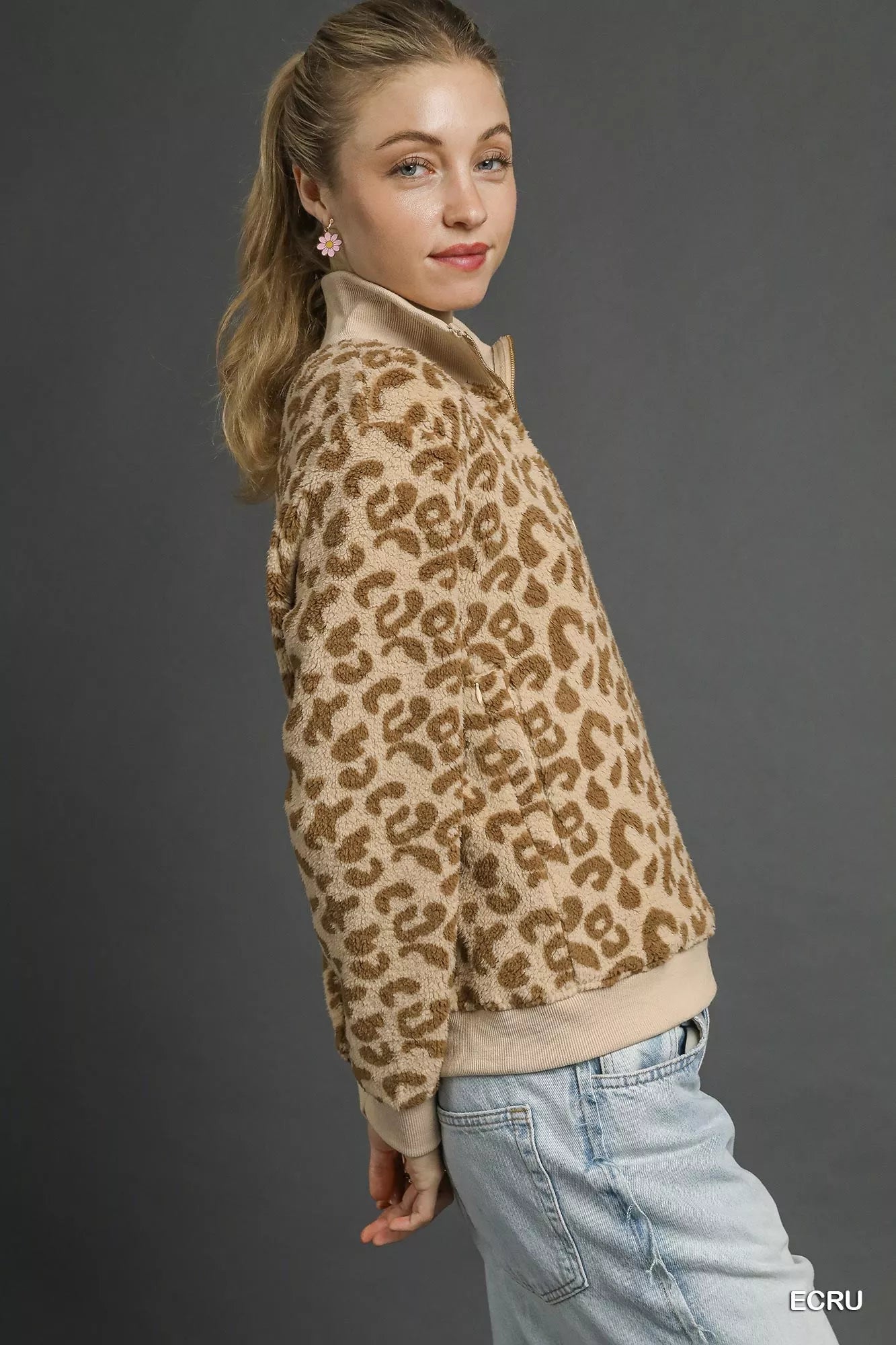 Ecru leopard print quarter-zip sweatshirt by Umgee featuring a cozy fit and stylish animal pattern.