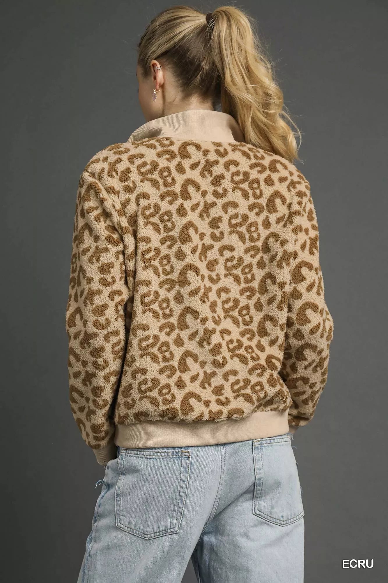 Ecru leopard print Umgee quarter-zip sweatshirt by Trendsi, featuring a cozy design and stylish pattern.