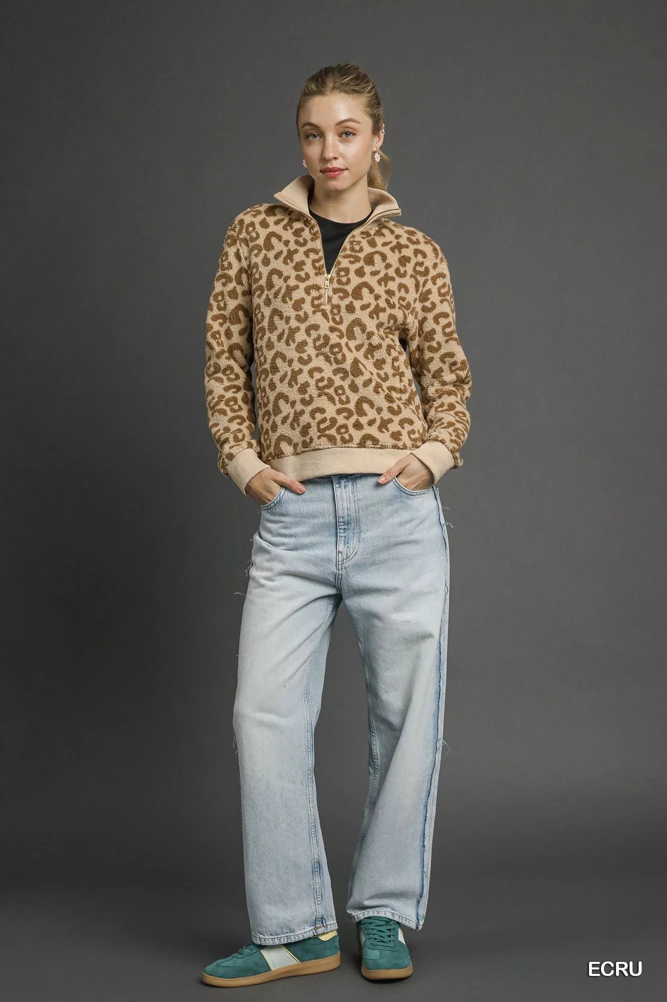 Ecru leopard print Umgee quarter-zip sweatshirt by Trendsi, featuring a stylish collar and comfortable fit.