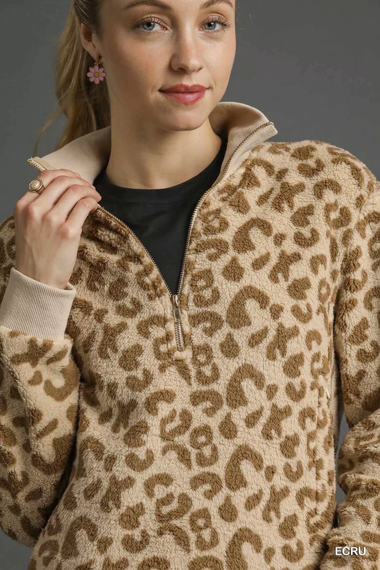 Ecru leopard print Umgee quarter-zip sweatshirt with ribbed cuffs and collar, casual and stylish for everyday wear