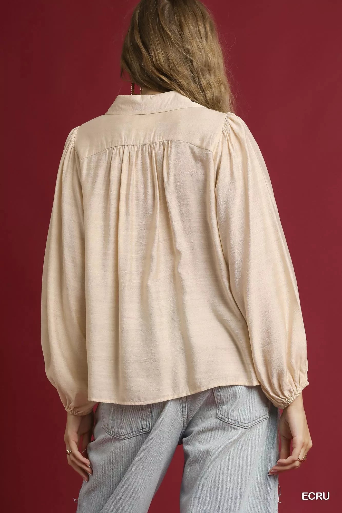 Ecru Umgee long sleeve blouse with leopard print trim, stylish casual top by Trendsi, featuring a relaxed fit and soft fabric.