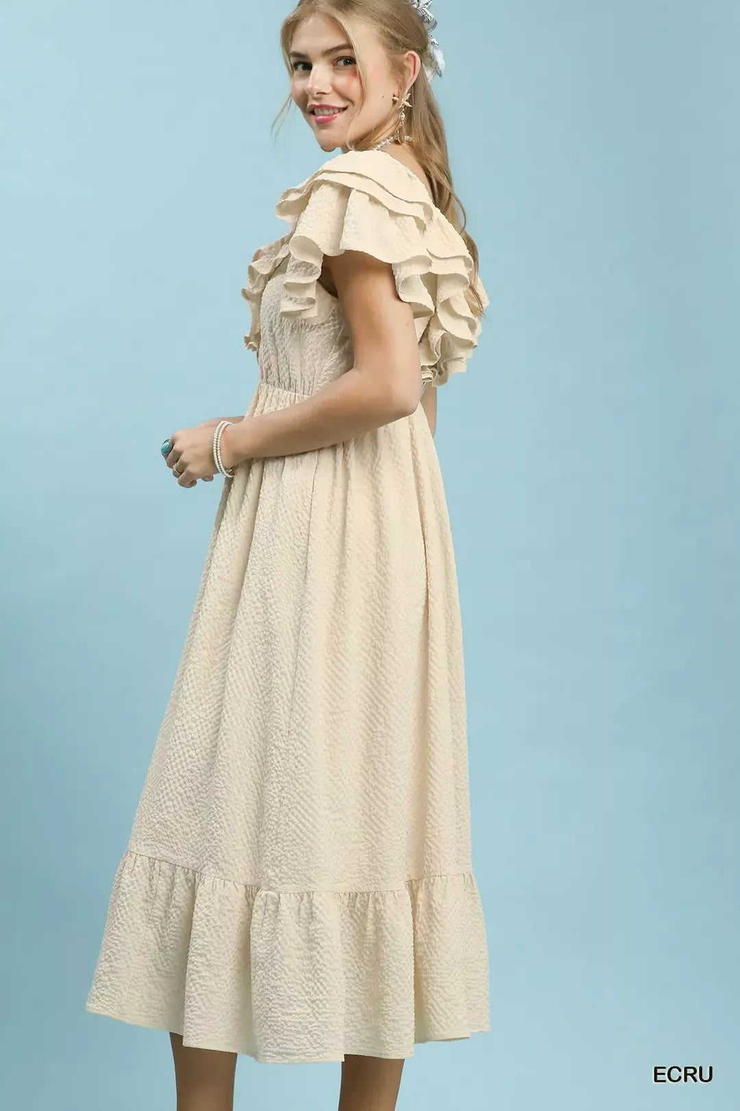 Ecru Umgee Textured Ruffle Midi Dress by Trendsi, featuring a stylish ruffle design and midi length, perfect for casual or dressy occasions.