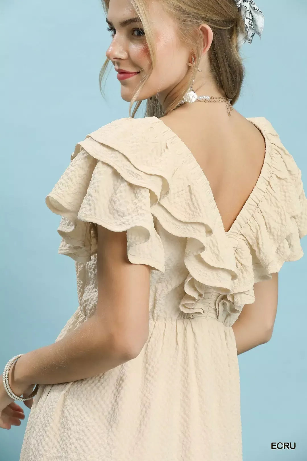 Ecru Umgee textured ruffle midi dress with flowy silhouette and tiered ruffle details, perfect for casual or semi-formal wear.
