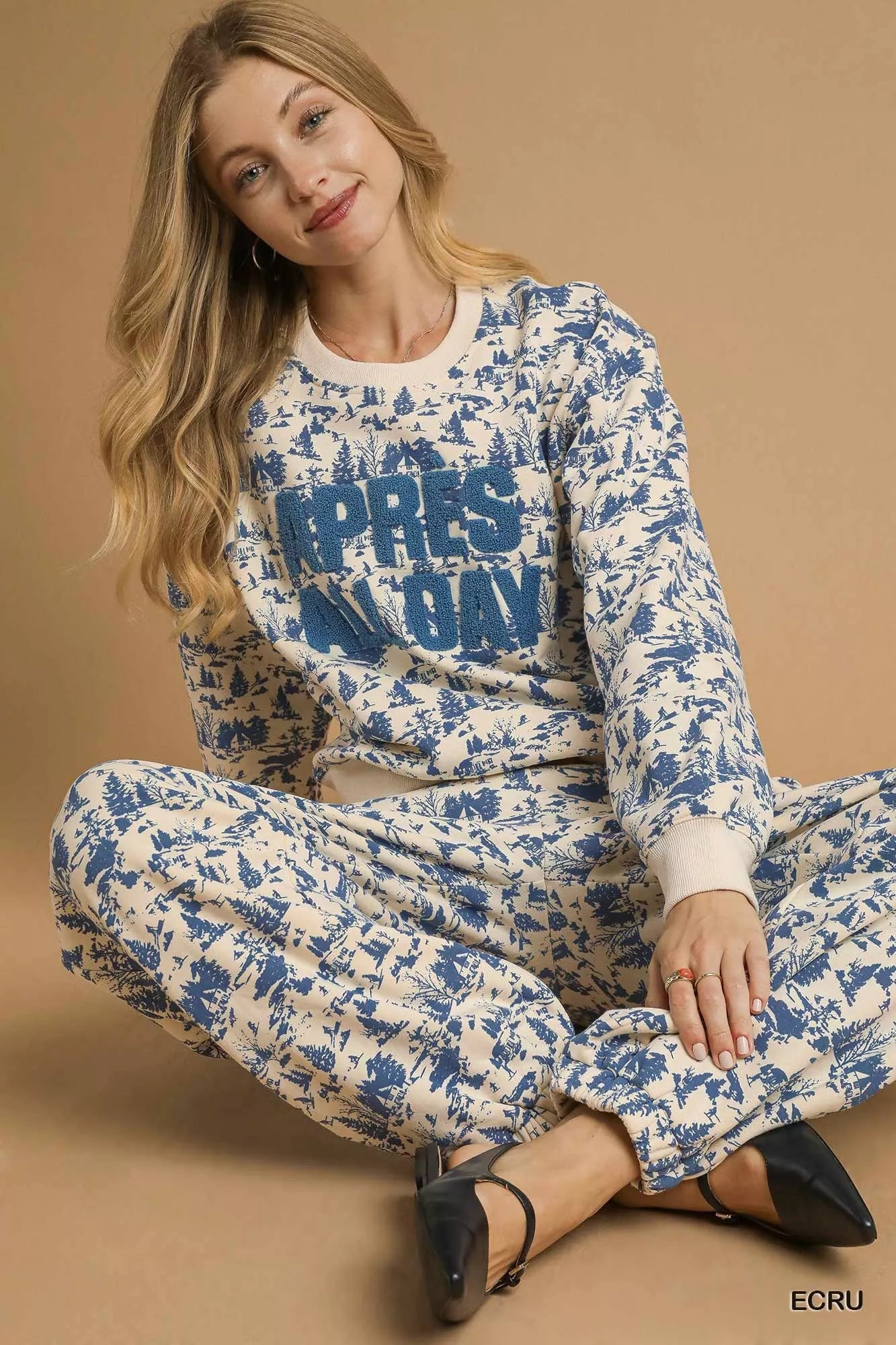 Light ecru cropped sweatshirt with scenic print design from Umgee, featuring a relaxed fit and casual style.