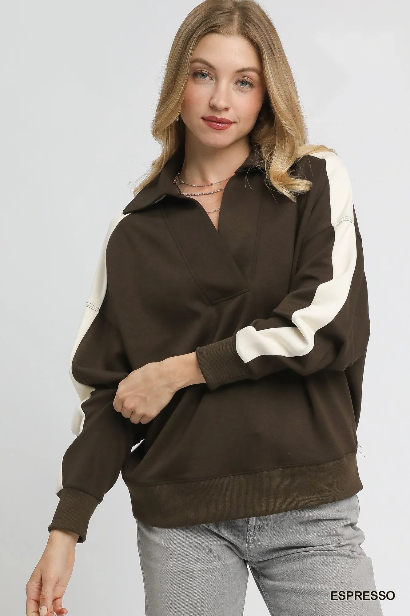 Light brown and cream color block Umgee polo sweatshirt by Trendsi, featuring a classic collar and relaxed fit.