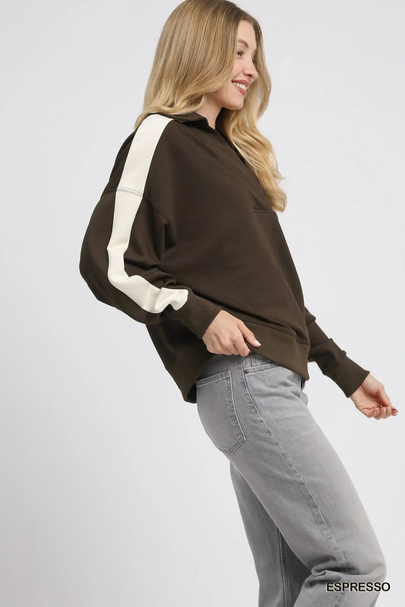 Light blue and beige color block polo sweatshirt by Umgee, featuring a relaxed fit and classic collar, on a white background.