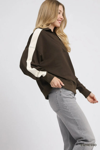 Light blue and beige color block polo sweatshirt by Umgee, featuring a relaxed fit and classic collar, on a white background.