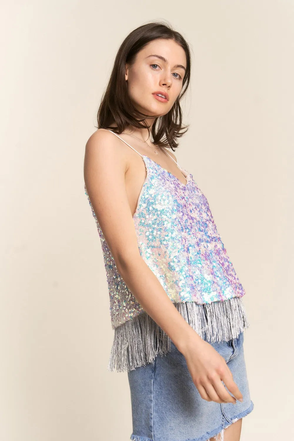 Flowy cami top with sequin tassel hem from J.NNA, featuring a lightweight, elegant design with shimmering accents.