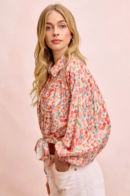 Trendi floral print crop shirt with tie hem detail, featuring a stylish, lightweight design perfect for casual wear.