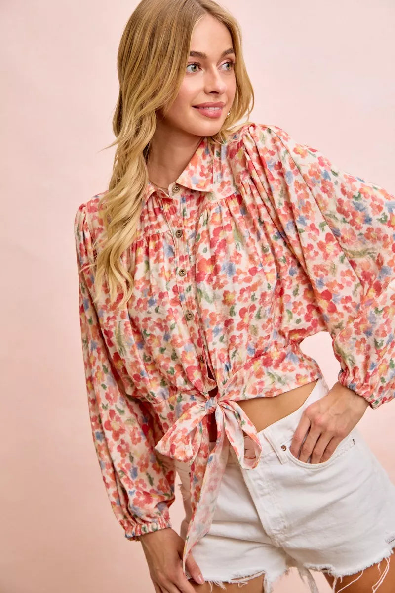 Trensi floral print crop shirt with tie hem detail, short sleeves, and vibrant floral pattern.