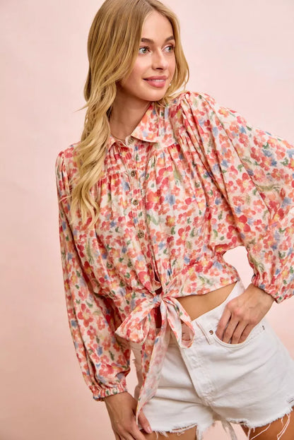 Trensi floral print crop shirt with tie hem detail, short sleeves, and vibrant floral pattern.