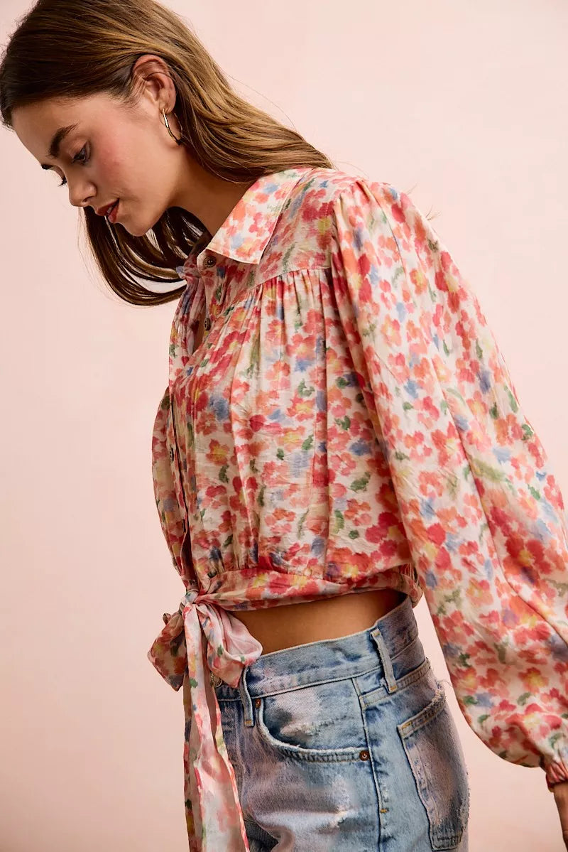 BiBi floral print crop shirt with tie hem detail from Trendsi, featuring a vibrant floral pattern and stylish cropped design.