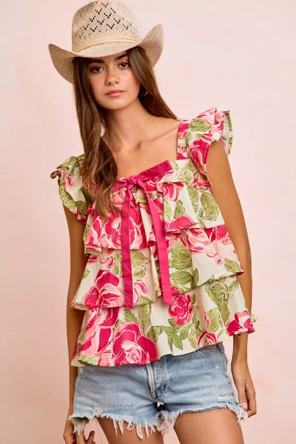 Trendsi BiBi floral print woven square neck top with ruffle detail and bow tie accents, showcasing a stylish, feminine design.