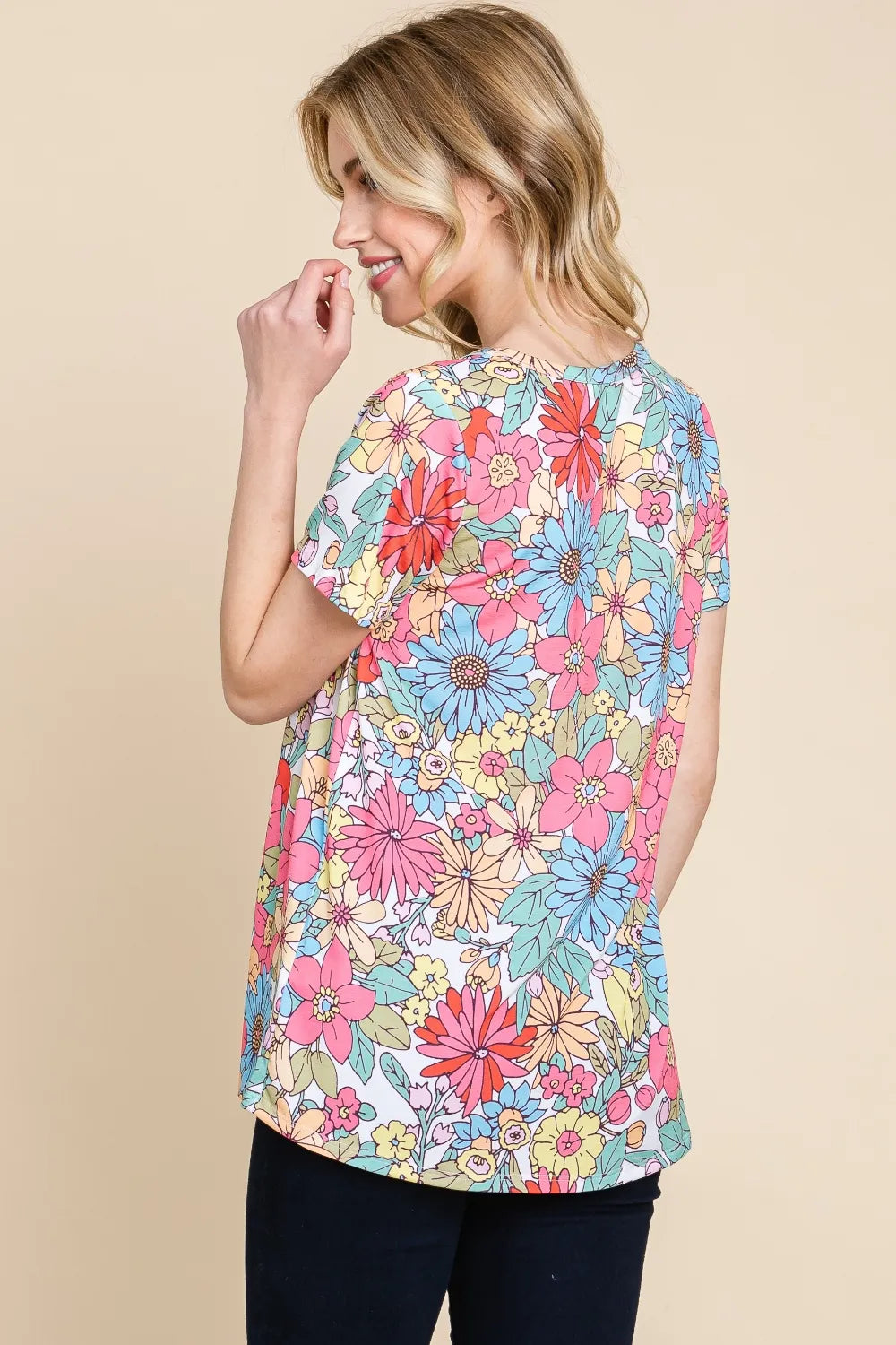 Trendsi BOMBOM floral short sleeve T-shirt featuring a vibrant floral print on soft fabric, casual and stylish for everyday wear.