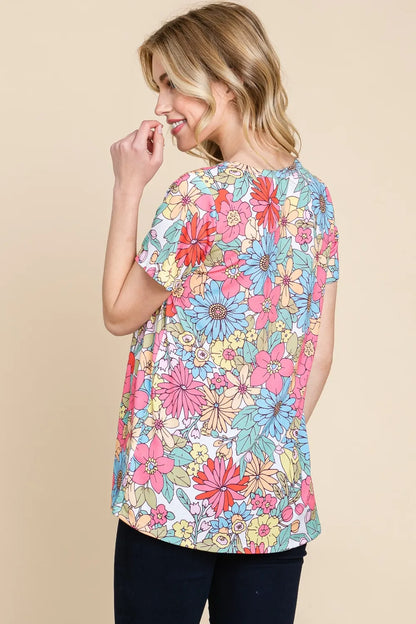 Trendsi BOMBOM floral short sleeve T-shirt featuring a vibrant floral print on soft fabric, casual and stylish for everyday wear.