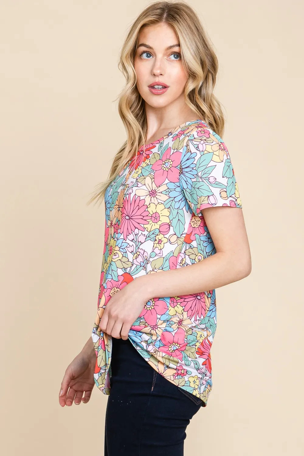 Trendsi BOMBOM floral short sleeve T-shirt with colorful floral pattern on soft fabric, casual and stylish for everyday wear.
