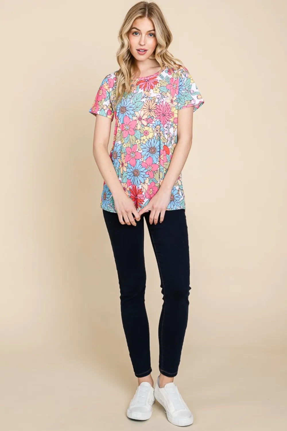 Trendsi BOMBOM floral short sleeve T-shirt with vibrant flower print, casual fit, and lightweight fabric for a stylish summer look.