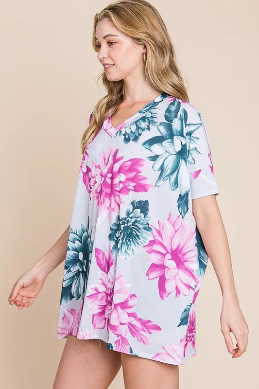 Trendsi BOMBOM floral V-neck short sleeve T-shirt with colorful floral print on soft fabric, stylish and comfortable for casual wear.