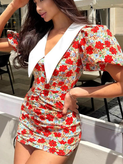 Floral print ruched mini dress with puff sleeves, stylish and feminine, by Trendsi, shown on a model.