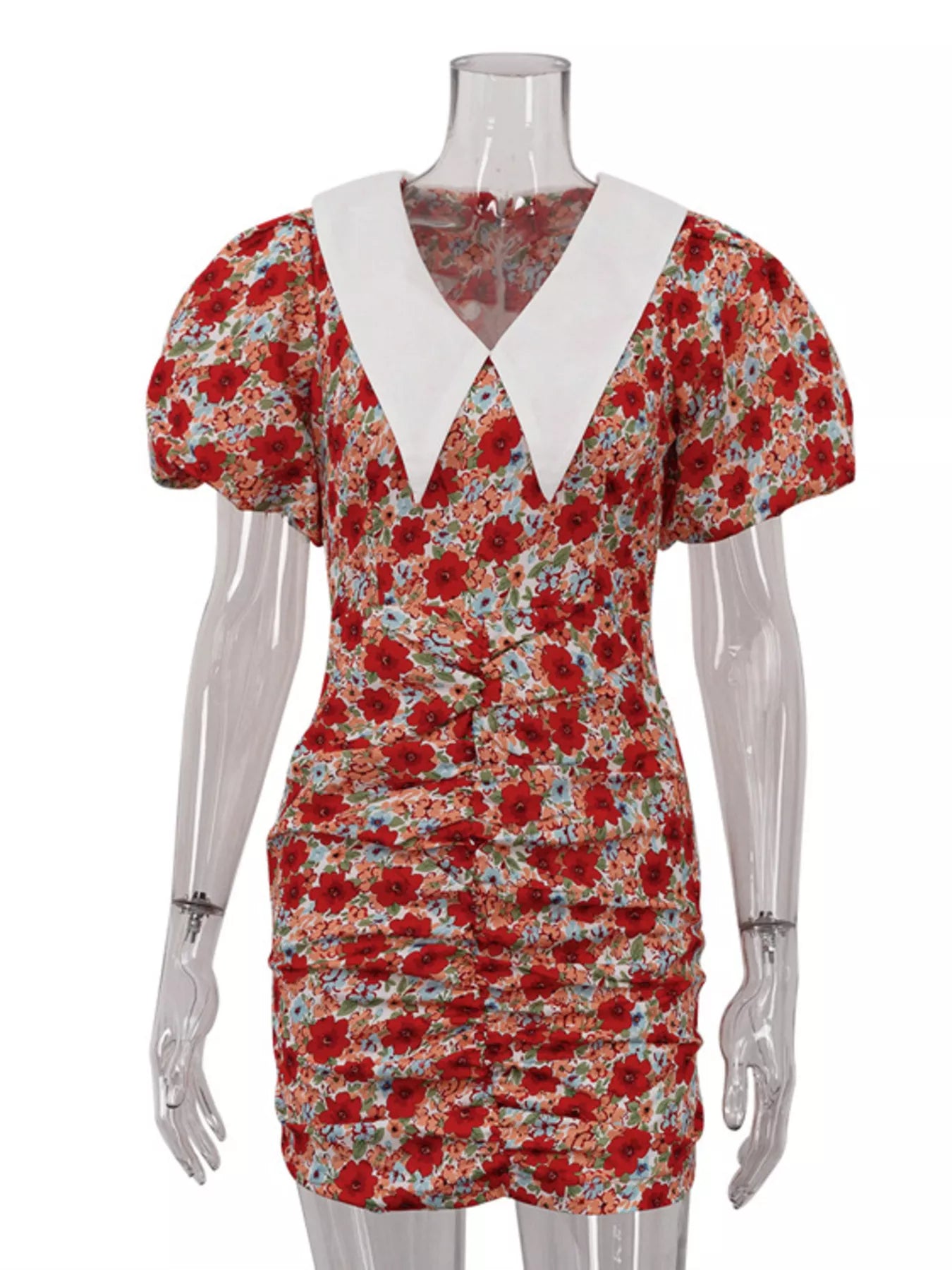 Floral print ruched mini dress with puff sleeves from Trendsi, featuring a fitted bodice and feminine design.
