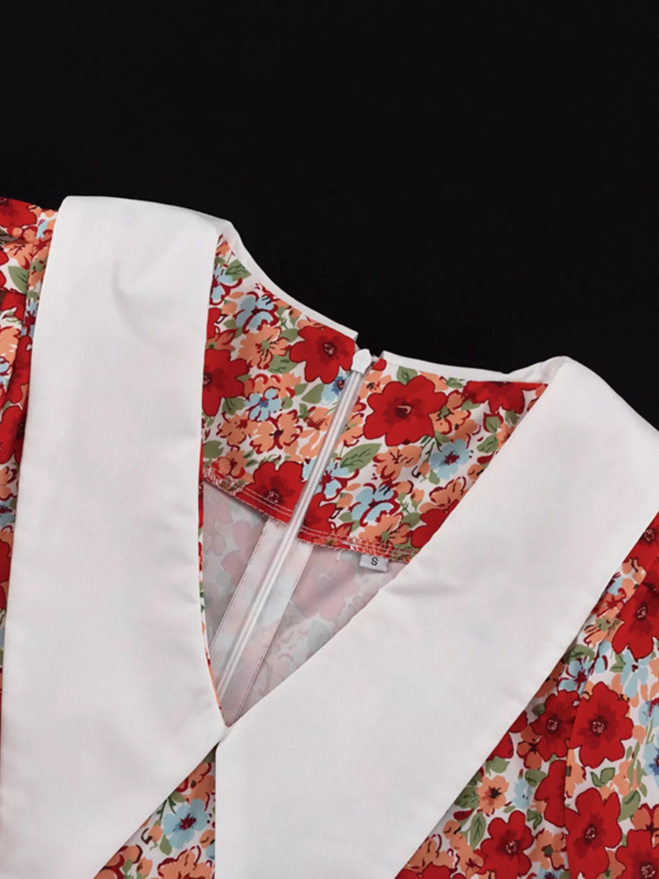 Floral print ruched mini dress with puff sleeves, stylish and feminine from Trendsi, perfect for spring or summer occasions.