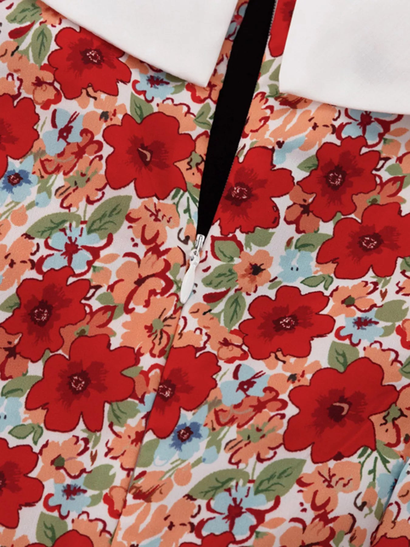 Floral print ruched mini dress with puff sleeves from Trendsi, featuring a fitted bodice and vibrant floral pattern.