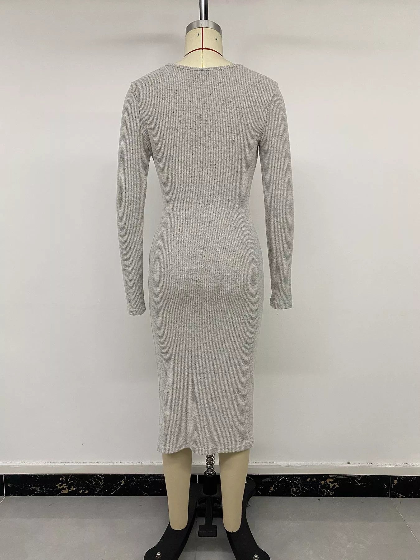 Gray ribbed knit twist front long sleeve midi dress with slit, stylish Trendsi women's dress featuring a fitted silhouette and elegant design.