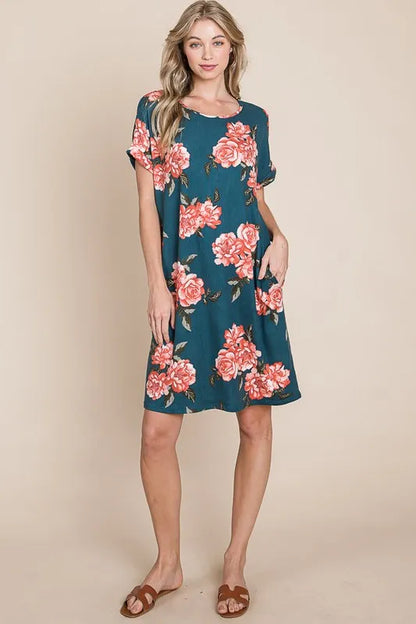 French blue BOMBOM floral round neck short tee dress with pockets, casual and stylish by Trendsi, shown on a model.