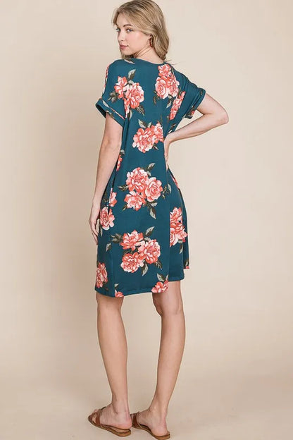 French blue BOMBOM floral round neck short tee dress with pockets by Trendsi, showcasing a casual, comfortable everyday style.
