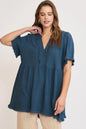 French blue Umgee plus size linen babydoll blouse with raw hem and notched details, featuring a relaxed fit and casual style.