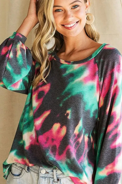 Fuchsia and charcoal tie-dye terry top with puff sleeves, stylish women's blouse from Trendsi featuring vibrant print and cozy fabric.