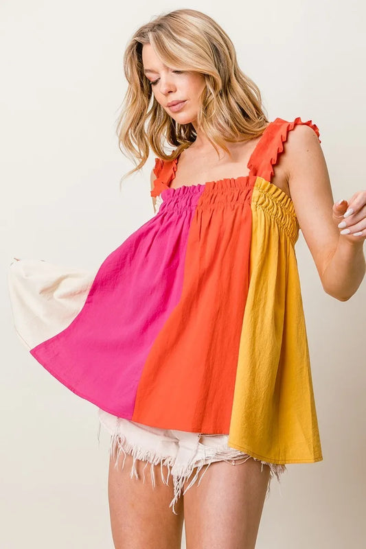 Fuchsia and coral color block BiBi frill shoulder strap bodice top by Trendsi, featuring a stylish sleeveless design.