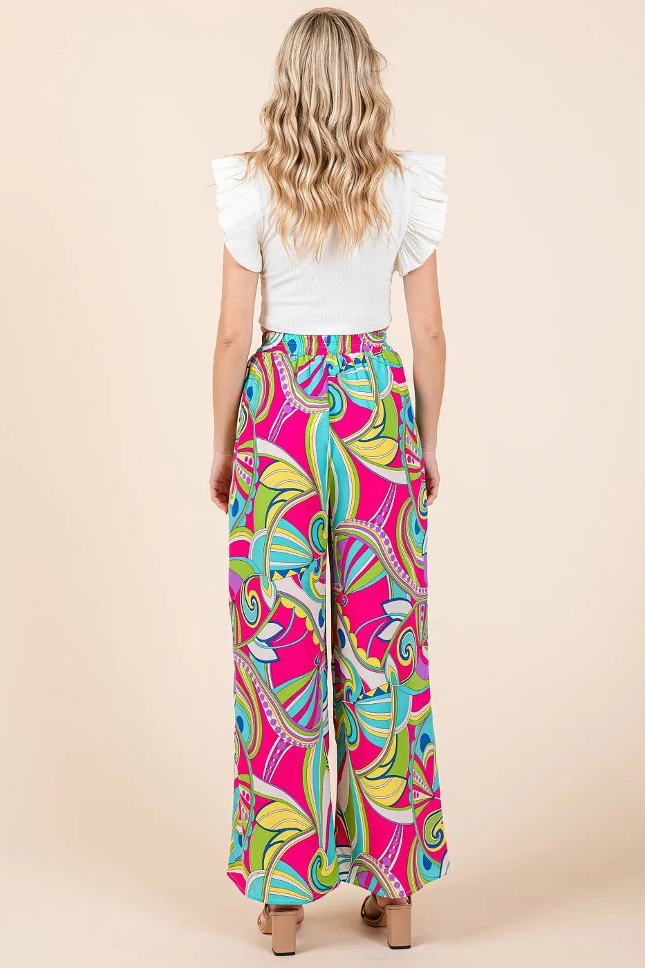 Fuchsia multicolor abstract print elastic waist wide-leg pants by Mittoshop, made by Trendsi, shown in a relaxed fit.